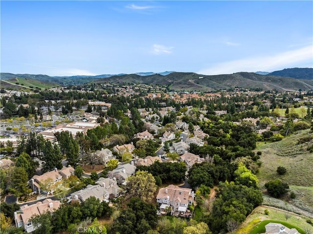 bird's eye view with a mountain view and a residential view