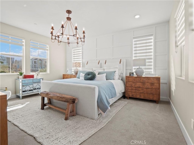 bedroom featuring a notable chandelier, recessed lighting, baseboards, and carpet floors