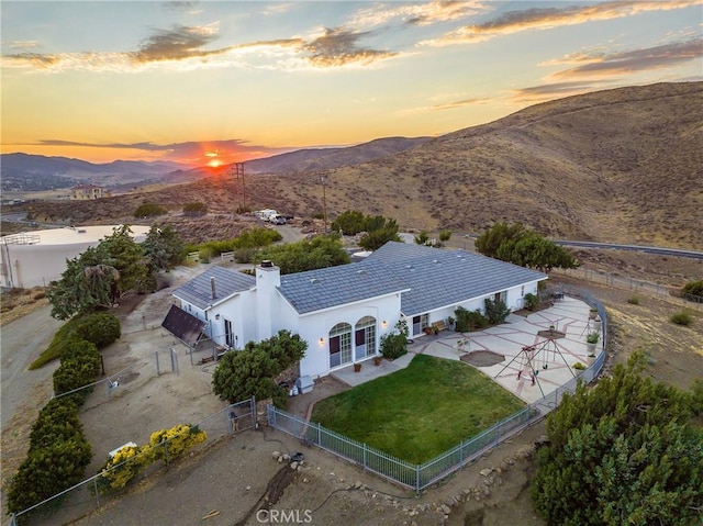 aerial view at dusk with a mountain view