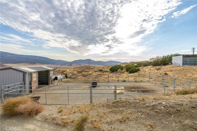 view of mountain feature featuring a rural view