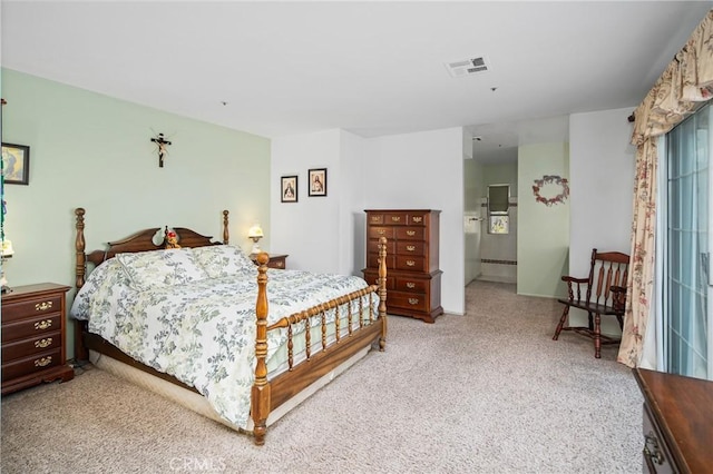 bedroom featuring visible vents and carpet