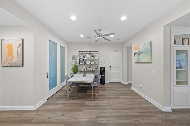 dining area with recessed lighting, wood finished floors, baseboards, and ceiling fan