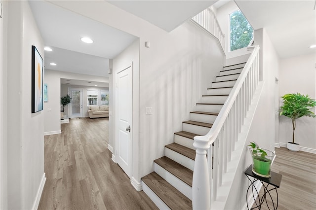 11119 Iris Ct, Corona, CA 92883 - stairway featuring wood finished floors and recessed lighting