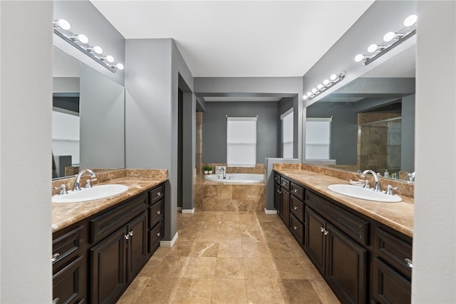 11119 Iris Ct, Corona, CA 92883 - full bathroom with two vanities, a shower stall, and a bath
