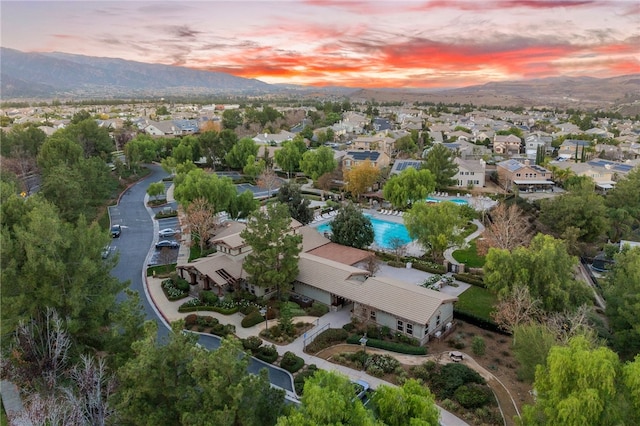 drone / aerial view featuring a mountain view and a residential view