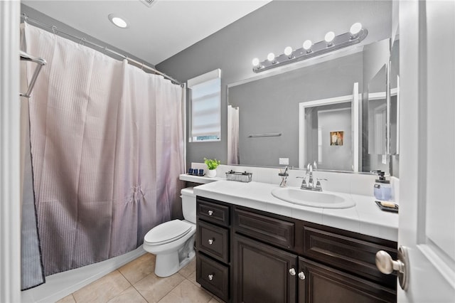 11119 Iris Ct, Corona, CA 92883 - bathroom featuring tile patterned floors, vanity, and shower / bath combo with shower curtain