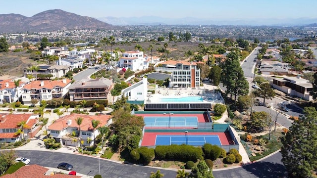 birds eye view of property with a residential view and a mountain view