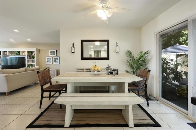 dining room with light tile patterned floors, breakfast area, a ceiling fan, and recessed lighting