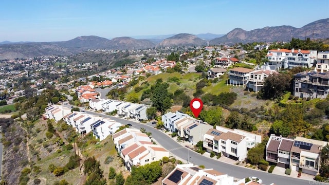 aerial view featuring a mountain view and a residential view