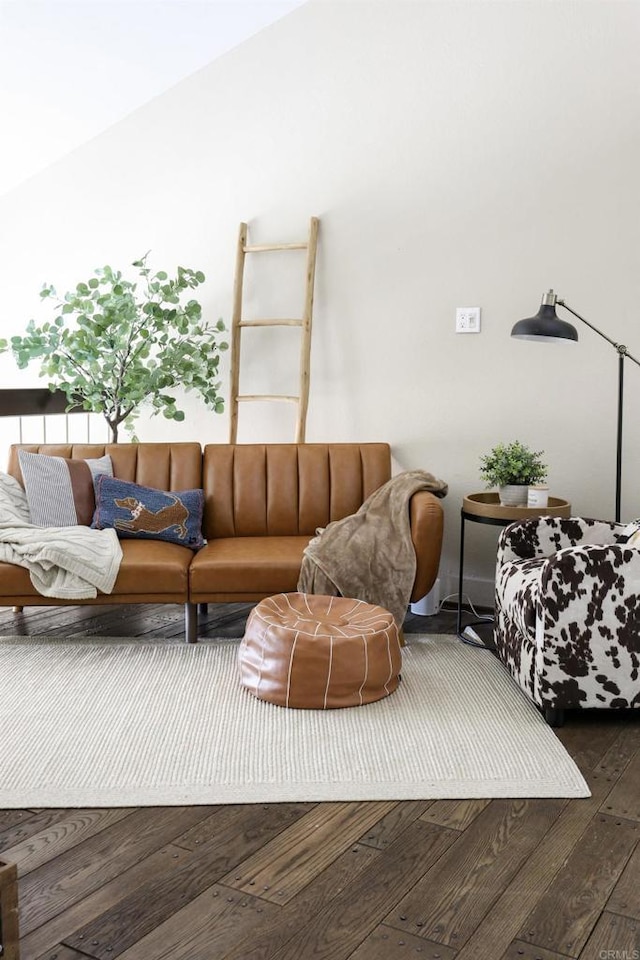 living area with hardwood / wood-style floors