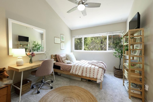 carpeted bedroom featuring vaulted ceiling