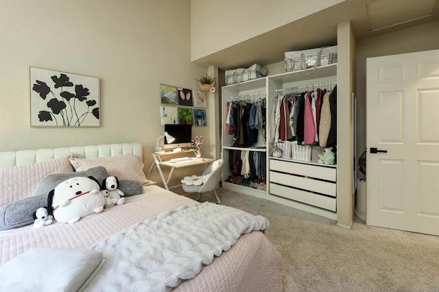 carpeted bedroom featuring a closet