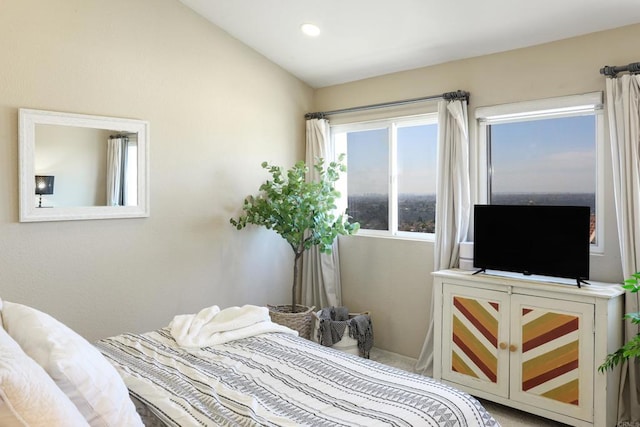 bedroom with recessed lighting and lofted ceiling