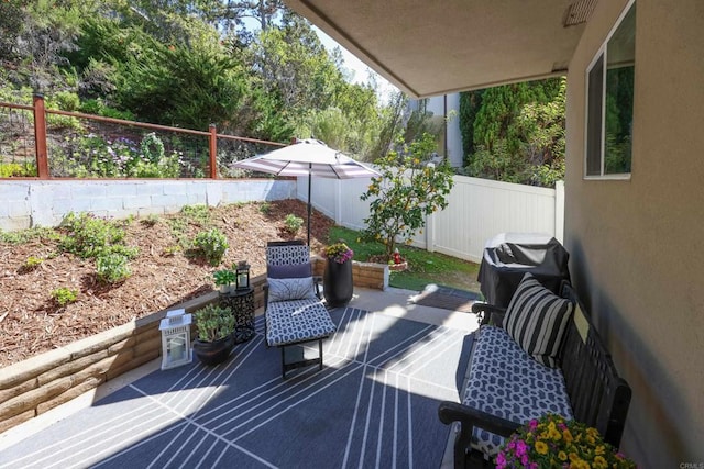 view of patio with a fenced backyard