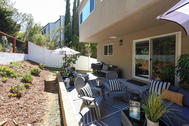 view of patio with fence