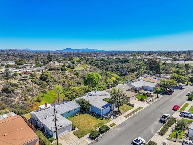 birds eye view of property featuring a mountain view