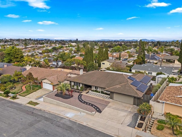 birds eye view of property with a residential view