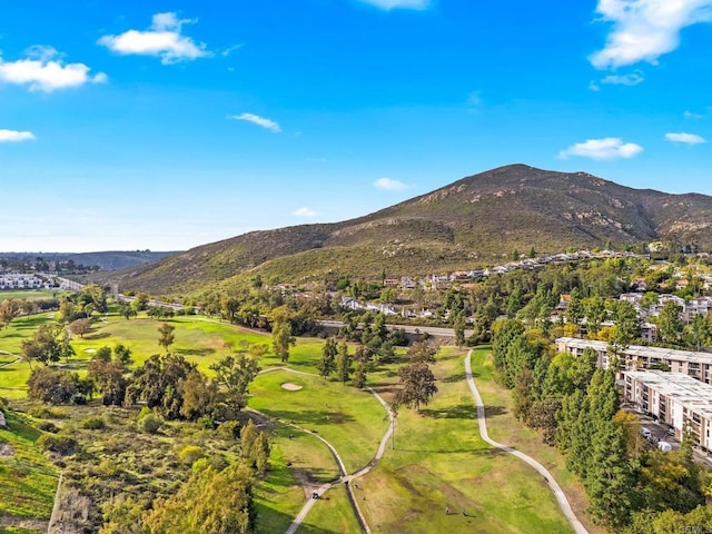 birds eye view of property featuring a mountain view