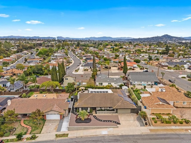 bird's eye view with a mountain view and a residential view