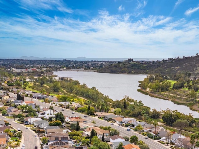 birds eye view of property featuring a residential view and a water view