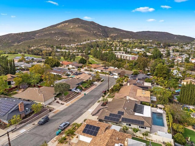 aerial view with a mountain view and a residential view