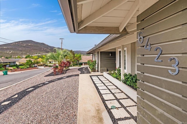 view of patio / terrace featuring a mountain view