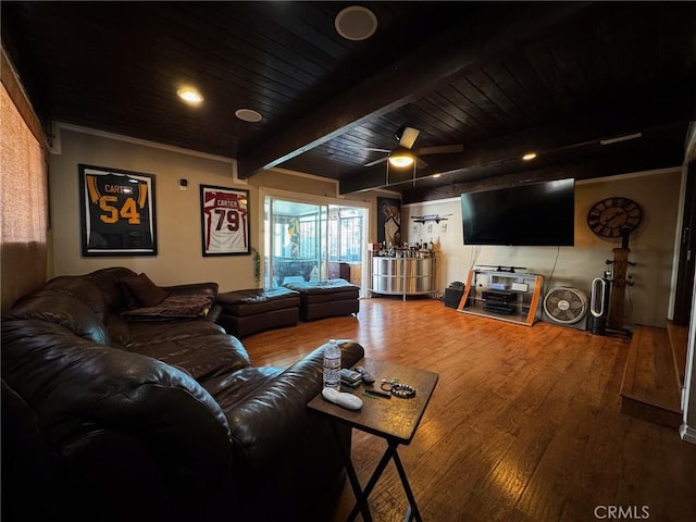 living room with crown molding, beam ceiling, wooden ceiling, wood finished floors, and a ceiling fan