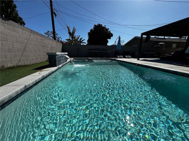 view of pool with a patio, central AC unit, a fenced backyard, and a fenced in pool