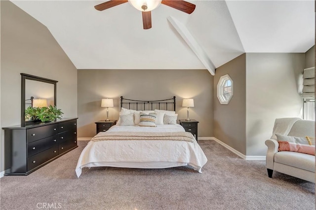 bedroom with lofted ceiling, carpet flooring, and baseboards