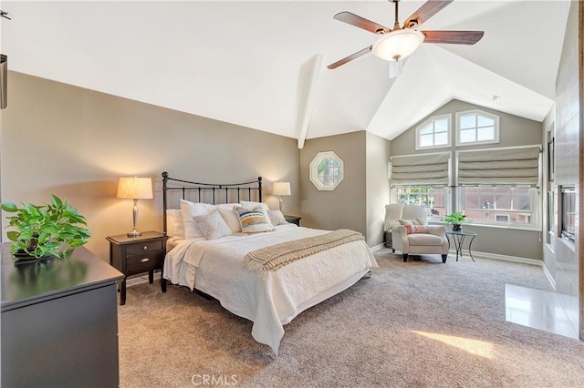 bedroom featuring baseboards, carpet floors, high vaulted ceiling, and a ceiling fan