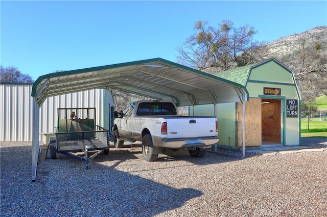 view of car parking featuring a carport