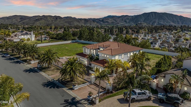 aerial view with a mountain view and a residential view