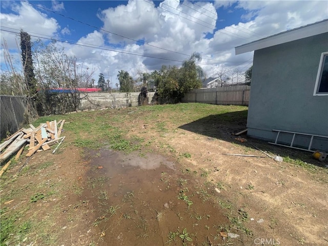 view of yard featuring a fenced backyard