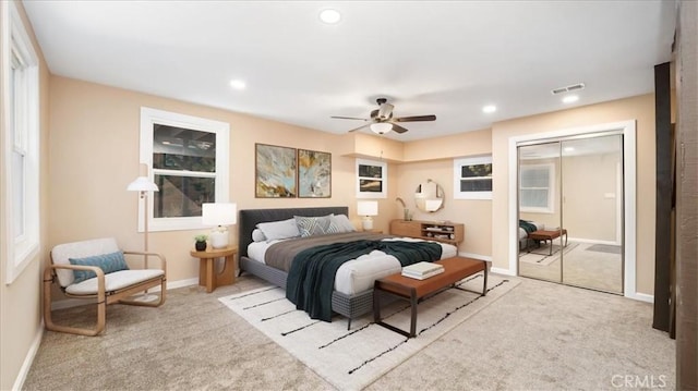 carpeted bedroom with recessed lighting, visible vents, baseboards, and ceiling fan