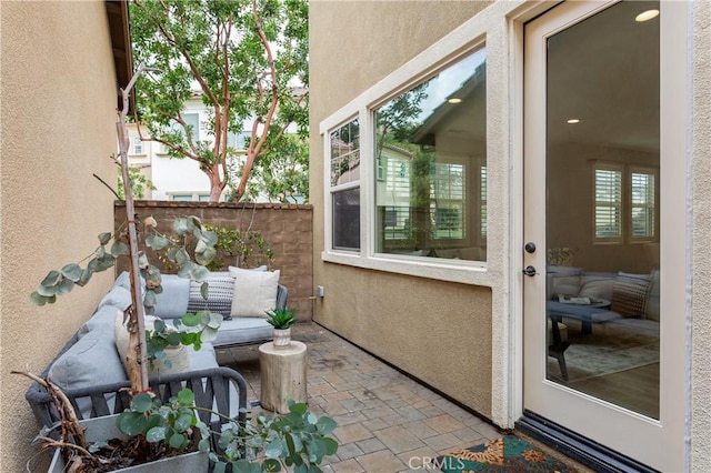 view of patio / terrace featuring fence