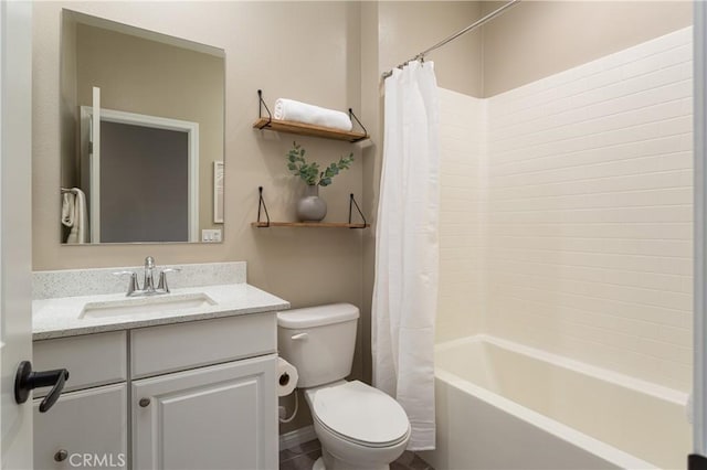 full bathroom with toilet, shower / bath combo, and vanity