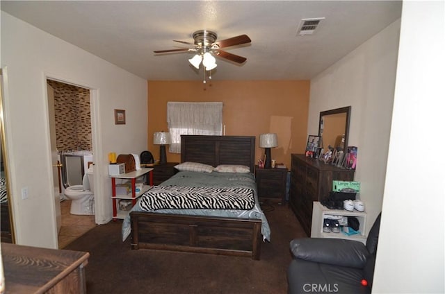 tiled bedroom featuring visible vents and connected bathroom