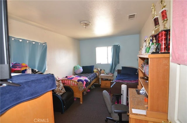 carpeted bedroom with visible vents