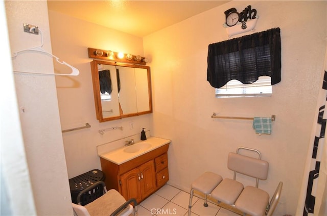 bathroom with vanity and tile patterned flooring