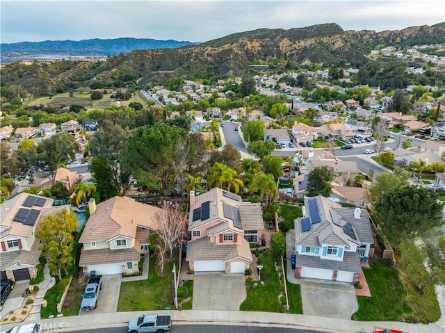 bird's eye view featuring a mountain view and a residential view