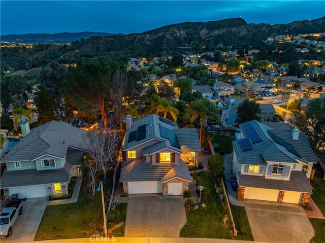 bird's eye view with a mountain view and a residential view