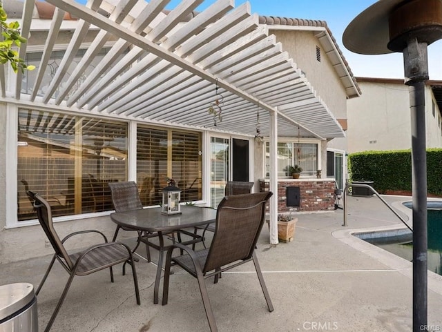 view of patio / terrace with a fenced in pool and outdoor dining area