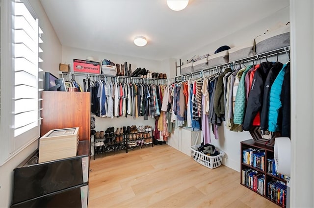 spacious closet with wood finished floors