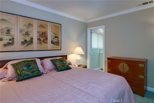 carpeted bedroom featuring ensuite bath, baseboards, visible vents, and ornamental molding