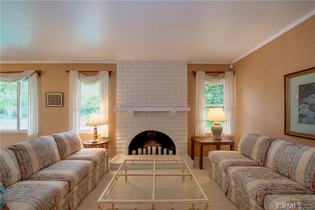 carpeted living area with a brick fireplace and ornamental molding