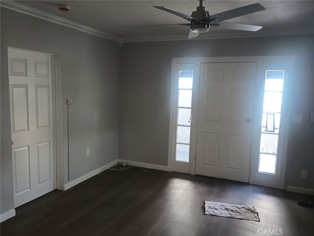 entrance foyer featuring dark wood finished floors, baseboards, crown molding, and a ceiling fan