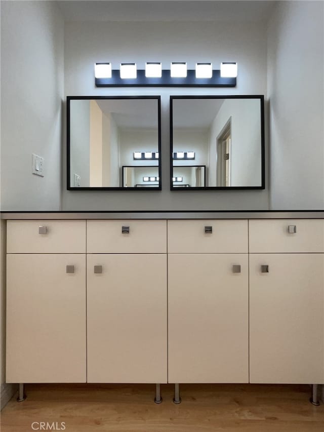 bathroom featuring wood finished floors