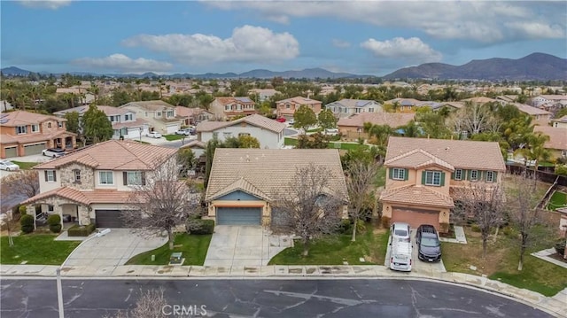 drone / aerial view with a mountain view and a residential view