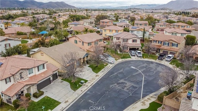 drone / aerial view featuring a mountain view and a residential view