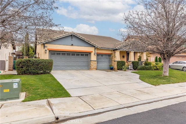 view of front facade featuring stucco siding, a tile roof, concrete driveway, a front yard, and a garage